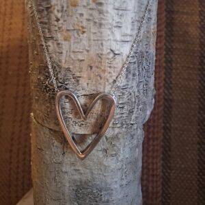 Silver heart on short chain